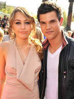 Taylor Lautner y Miley Cyrus Premiados